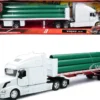 Volvo VN-780 Truck with Flatbed Trailer and Long Pipes White "Long Haul Truckers" Series 1/32 Diecast Model by New Ray